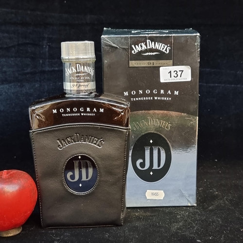 137 - Star Lot: A sealed Jack Daniels 94 Proof Monogram Tennessee Whiskey.  75 cl bottle in original black... 