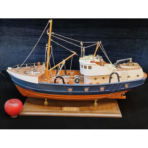 Sold at Auction: A wooden scale model of a fishing boat. 30 x 36 x 9 in.  (76.20 x 91.44 x 22.86 cm.)