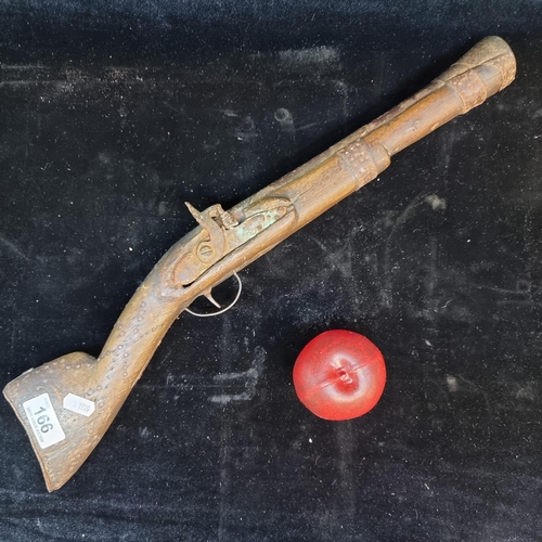 166 - An antique blunderbuss musket with flared muzzle and studded wooden stock. A great display gun L54cm... 