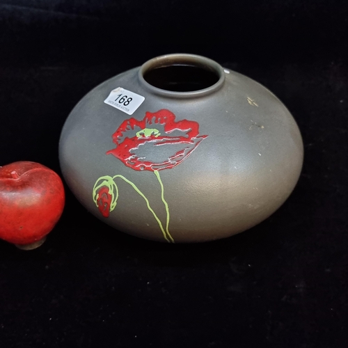 168 - A German made ceramic vase by Amano for Scheurich. Featuring a hand painted poppy flower on a matte ... 