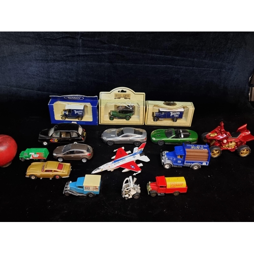 174 - A box of fifteen vintage model cars. Including examples by Corgi, Tetley and Matchbox.