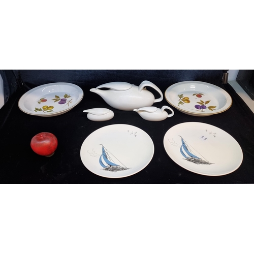 177 - Seven pieces of fine porcelain including two Palissy sail boat plates, two Royal Worcester Evesham s... 