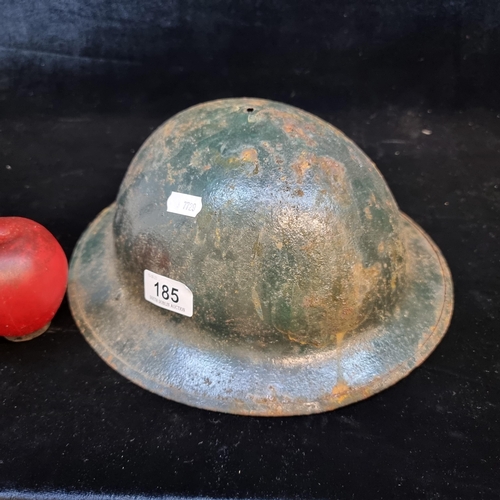 185 - An original  antique WWI Doughboy steel helmet.