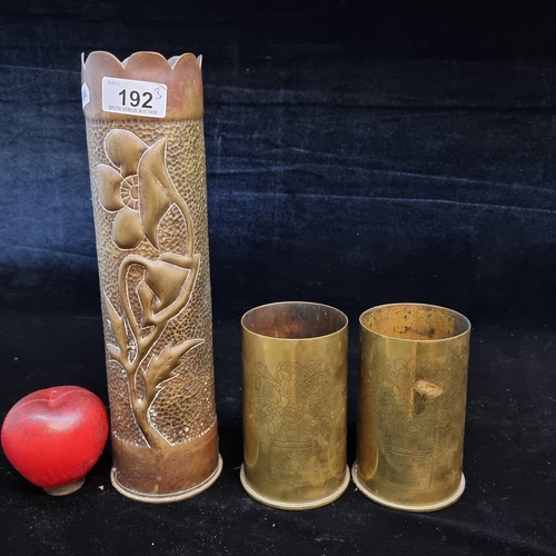 192 - A trio of trench art brass shells. Including two neat sized examples marked ''Souvenirs of The Great... 