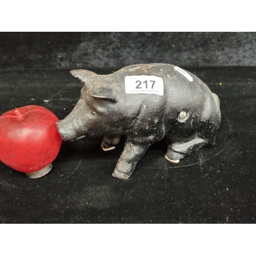 217 - A very heavy vintage  cast metal characterful pig money box.