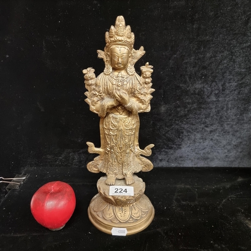 224 - A heavy vintage large brass figure of an Indian deity. Features lovely detail.