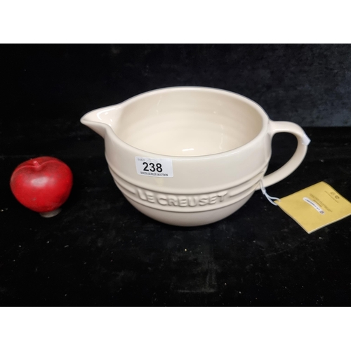 238 - A large new Le Creuset mixing jug. With original tag. In very good condition. With RRP of €45 on lec... 