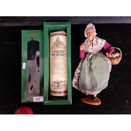 247 - Two items including a  boxed centenary Easter Rising candle with original box and a figure of an eld... 