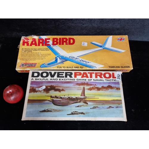 252 - Two vintage items of aircraft interest including a Rare Bird towline glider model building set with ... 