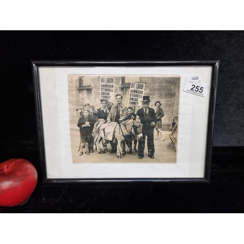 255 - A framed black and white photo print depicting gathered voters promoting the Irish Labour party. Gre... 