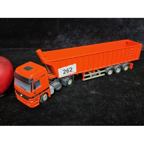 262 - A diecast Joal model of a Mercedes tipping lorry advertising Tisvol. Scale of 1:50. With an elevatin... 