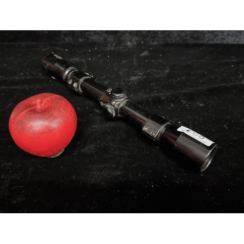 266 - A vintage Japanese rifle scope with atlas coated 4x32 lenses. Features different settings.