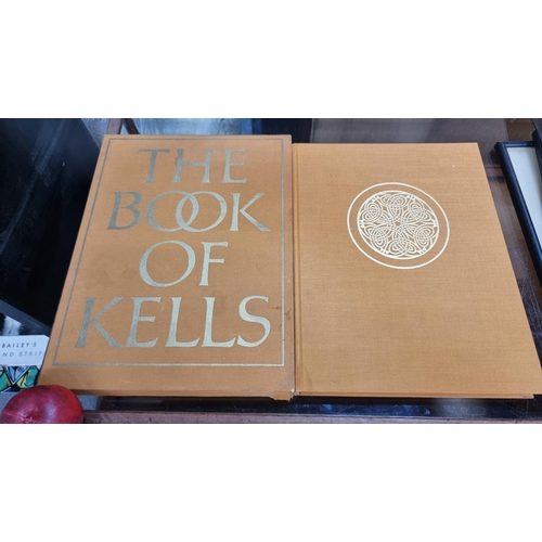 A hardback copy of the book ''The Book Of Kells'' by Thames & Hudson. Containing 126 colour plates and 75 monochrome illustrations. Published in 1977. With slip case. Some wear to case but book itself in excellent condition.