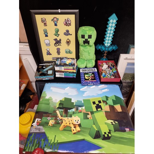 258 - A large selection of Minecraft items including eleven guide books, tin boxes with more guides, stick... 