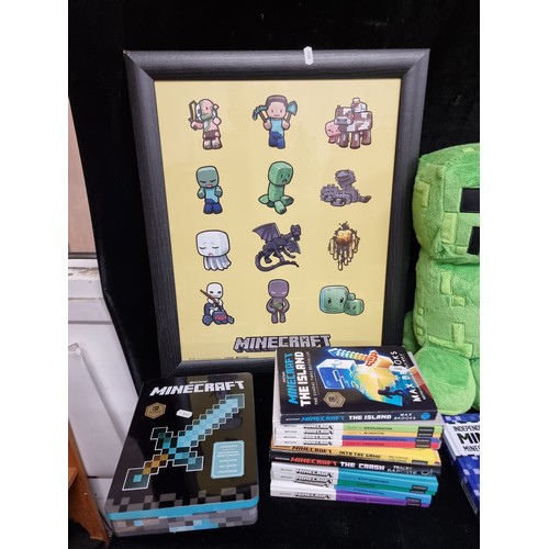 258 - A large selection of Minecraft items including eleven guide books, tin boxes with more guides, stick... 