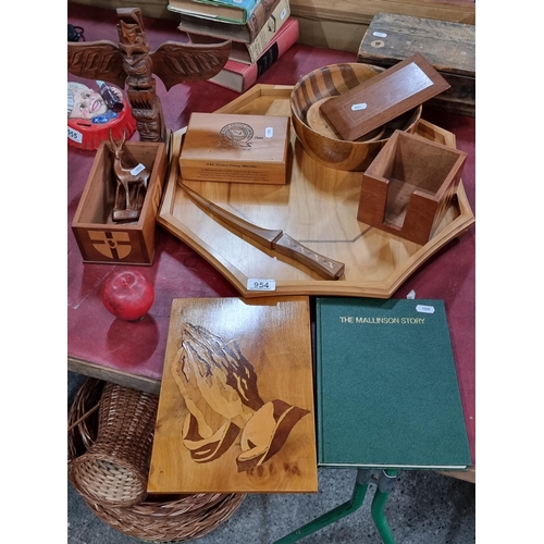 954 - A selection of ten items with wooden boxes, totem pole figure, tray, bowls and letter knife. Along w... 