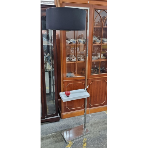 957 - Star Lot : A very stylish contemporary floor standing lamp with integrated table by Branco. Designed... 