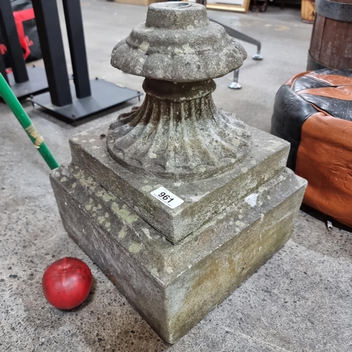 961 - A large reconstituted stone parasol base. A great Classical example with gadrooned and bevelled base... 