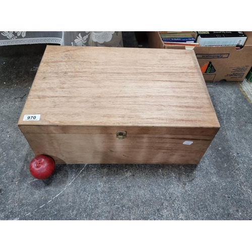 970 - A large wooden wine storage box. To hold and display six bottles of alcohol. With wooden dividers an... 