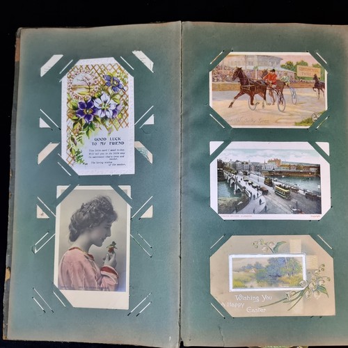 173 - A beautiful antique Postcard Album containing sixty-one postcards of Irish and UK interest. Includin... 