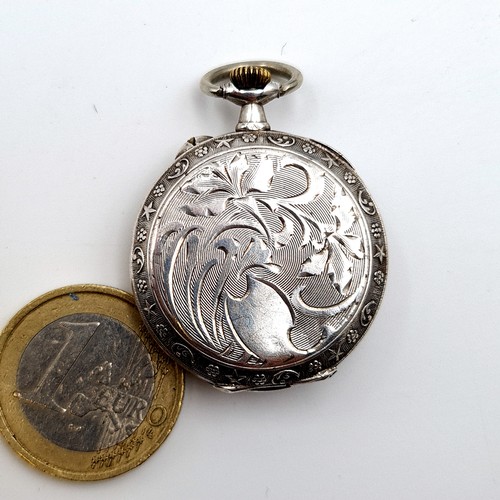 6 - A fine example of a Sterling silver cased fob watch, featuring an enamelled figure dial and gilded a... 