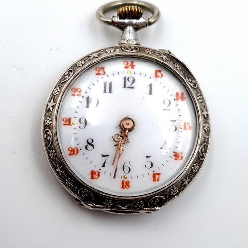 6 - A fine example of a Sterling silver cased fob watch, featuring an enamelled figure dial and gilded a... 