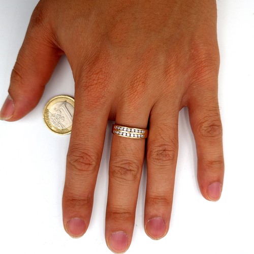 15 - A beautiful and heavy 9 carat gold channel set White Sapphire half eternity ring. Stamped 375. Ring ... 