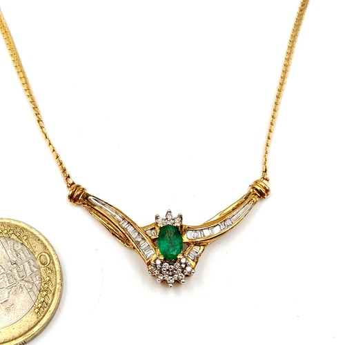 36 - Star Lot: A truly exquisite Emerald and Diamond 10 carat gold pendant necklace, featuring a beautifu... 