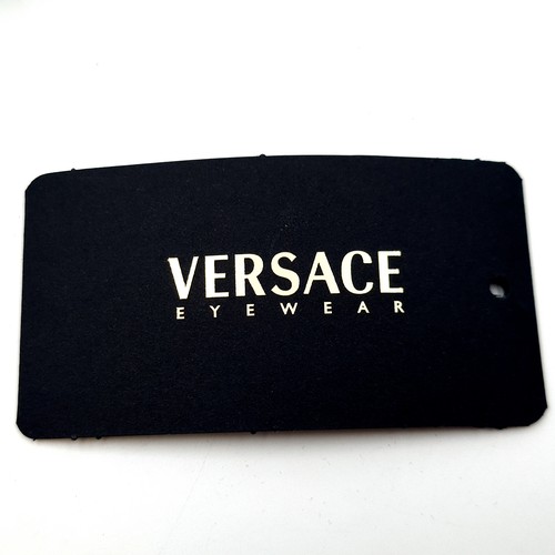 43 - A stylish pair of wrap around original designer Versace Italian made sunglasses. Featuring dark lens... 