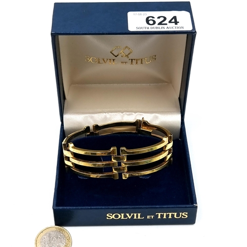 624 - A stylish vintage gold toned three band gate link style bracelet. Weight: 45.87 grams. Not marked. D... 