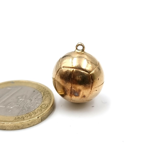 628 - A 9 carat gold Charm, in the form of football. Weight: 5.92 grams. Stamped 375.