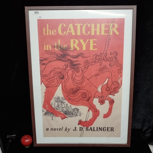 74 - A large framed poster featuring the book cover for the classic coming of age novel The Catcher in th... 