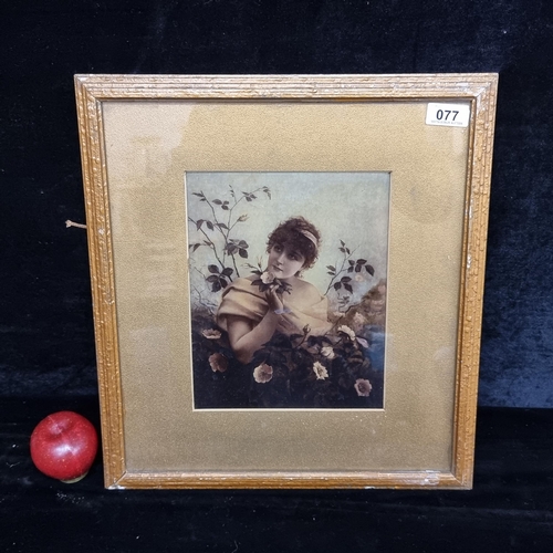 77 - A lovely print of a photograph of an elegant early 20th century lady with delicate roses. Housed in ... 