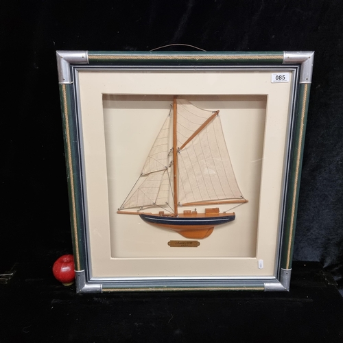 85 - A handcrafted wooden yacht titled 