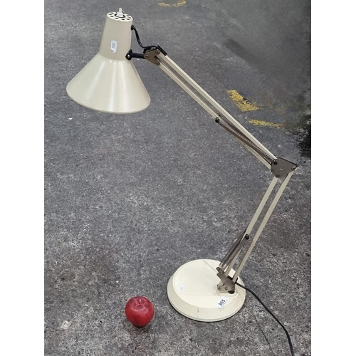 865 - A vintage Anglepoise style desk lamp by Belgian brand BHS Lighting. With cream colourway and weighte... 