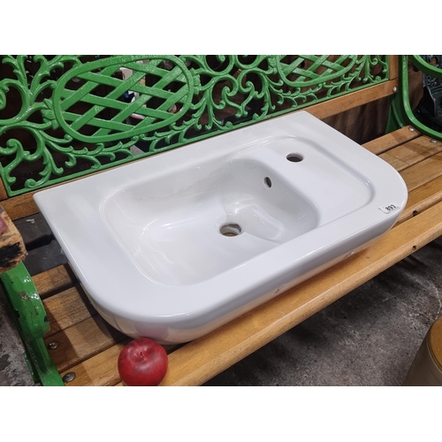 893 - A large new ceramic kitchen sink in a white finish. In excellent condition. W65cm x D38cm.