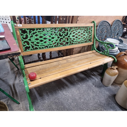 895 - Star Lot : A fabulous heavy antique outdoor garden bench with heavy cast metal frame and slatted woo... 