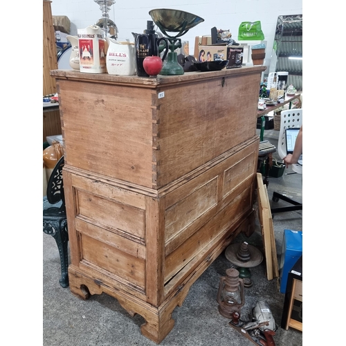 913 - Star lot : A very large antique solid oak chest of drawers with deep lidded chest to top, along with... 