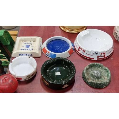 926 - Six ceramic and metal ashtrays including Wade examples for Cutty Sark and Carrolls. Along with one f... 