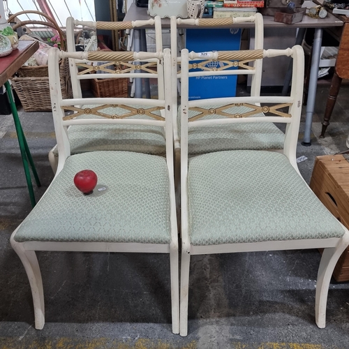 929 - A set of four vintage handsome dining chairs with ornate frames featuring gold toned carved detail t... 