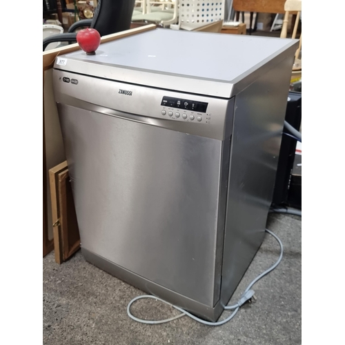 977 - A Zanussi Dishwasher (Model ZSF6128). A++ rated with a three pin plug. Presented with original model... 