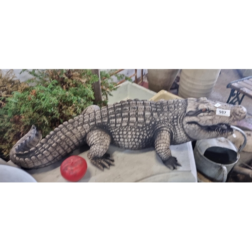 987 - Star Lot - A striking reconstituted stone garden statue of a crocodile / alligator. Painted with a r... 