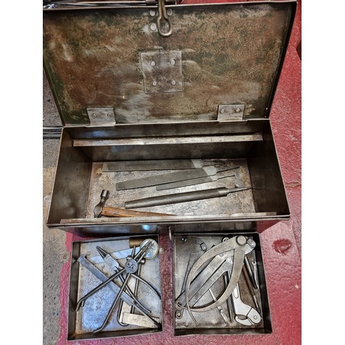 166 - A large cast metal vintage tool box filled with a great selection of vintage tools mostly named with... 