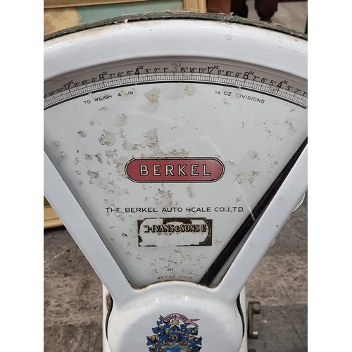 936 - A vintage British made Berkel  shop scale from H. Evans & Sons. With an enamel frame, display and me... 