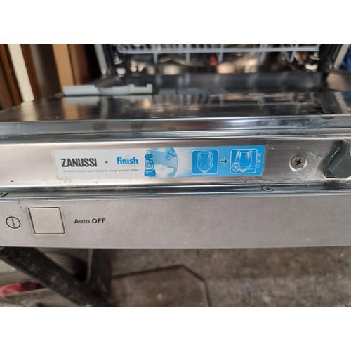 977 - A Zanussi Dishwasher (Model ZSF6128). A++ rated with a three pin plug. Presented with original model... 