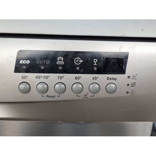 977 - A Zanussi Dishwasher (Model ZSF6128). A++ rated with a three pin plug. Presented with original model... 