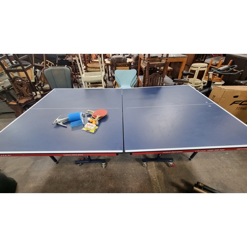 1009 - Star Lot - An as new LYRIC branded Indoor Fast Play table tennis table. Featuring an excellent playb... 