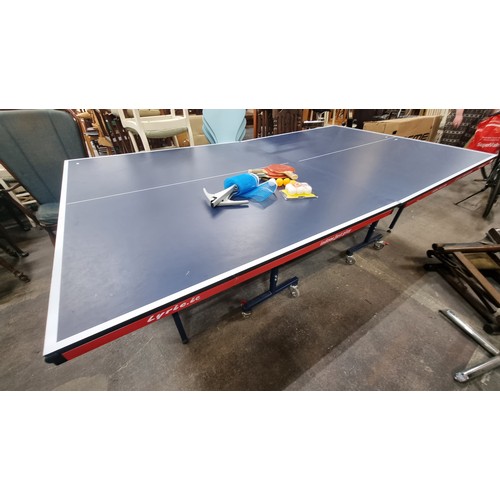 1009 - Star Lot - An as new LYRIC branded Indoor Fast Play table tennis table. Featuring an excellent playb... 