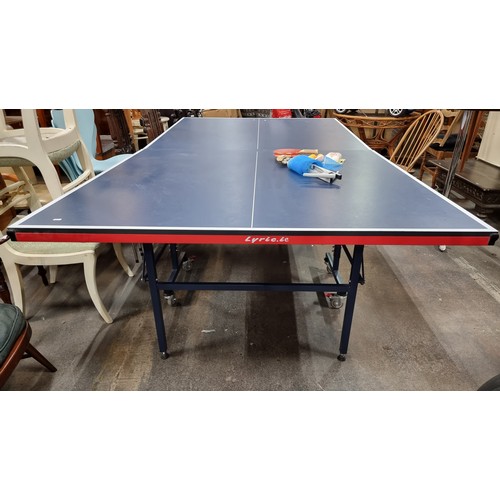 1009 - Star Lot - An as new LYRIC branded Indoor Fast Play table tennis table. Featuring an excellent playb... 