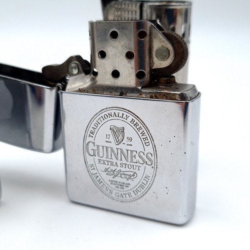 7 - A collection of four flint lock lighters, comprising of modern and vintage design. This includes a v... 